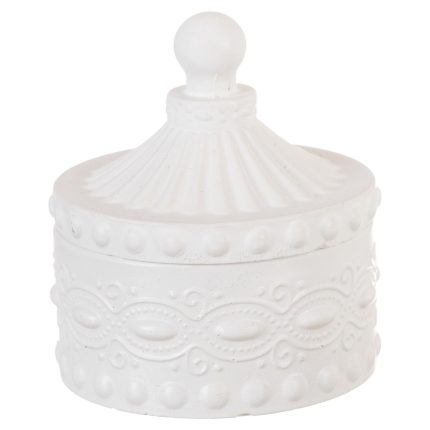 White ceramic jar with a domed lid and decorative embossed pattern (ornate, textured surface).