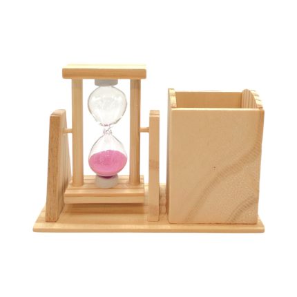 Wooden hourglass with pink sand in a light wood frame, set on a base next to a rectangular wooden box/holder on a white background