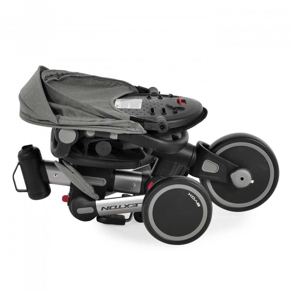 7462322-1000x1000 Folded compact baby stroller in gray and black with wheels visible, ready to carry or store