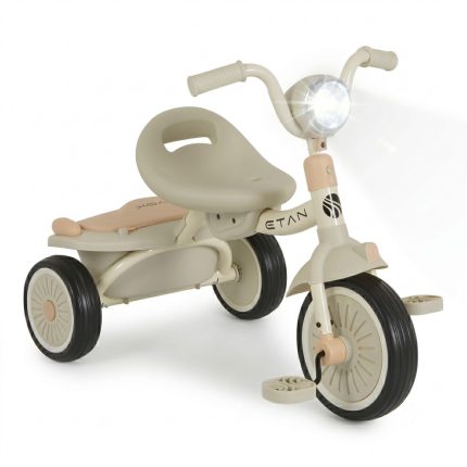 Beige plastic toy tricycle for toddlers with three wheels, curved seat, and front headlight.