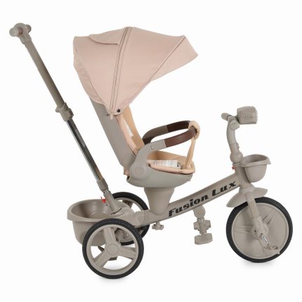 Beige child’s tricycle with a canopy, padded seat, and large rear storage bin labeled Fusion Luxs.