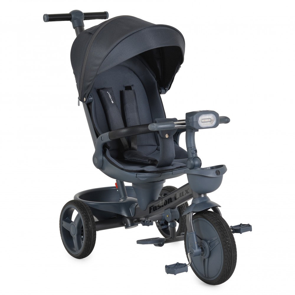 7462831-1000x1000 Dark blue three-wheeled stroller/trike with canopy, padded seat, harness, and front light.