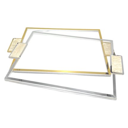 Geometric metal frame sculpture with overlapping silver and gold rectangular accents tilted at an angle.