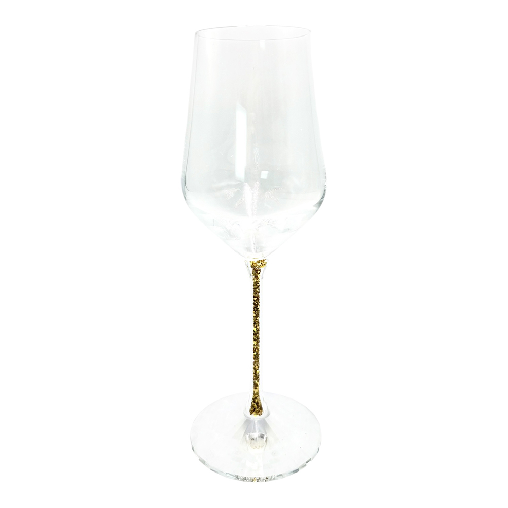 9D1C0BF0-7070-3157-71BB-019E87459C99_1 Clear wine glass with a glittery gold stem on a white background.