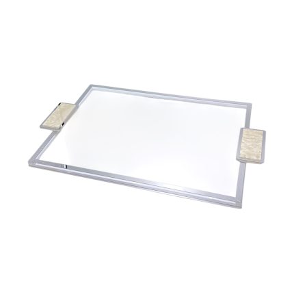 Rectangular, chrome-framed mirror with two beige decorative blocks on opposite sides.