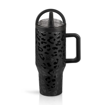 Black leopard-print insulated travel mug with a handle and clear lid. (Reusable tumbler)