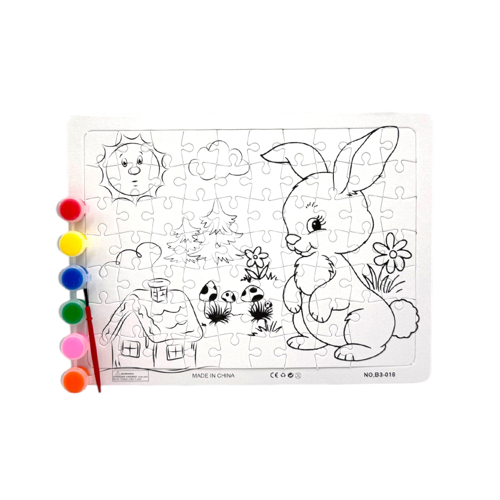 0019B99F-0C90-215E-91B1-019D90AF494B_11 | La Vie en Rose Children's jigsaw puzzle page featuring a cartoon bunny in a garden with a sun, trees, flowers, and a house, along with paint pots on the side.