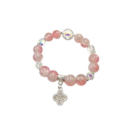Pink beaded bracelet with round crackle beads, iridescent crystals, and a silver quatrefoil charm hanging from the clasp.