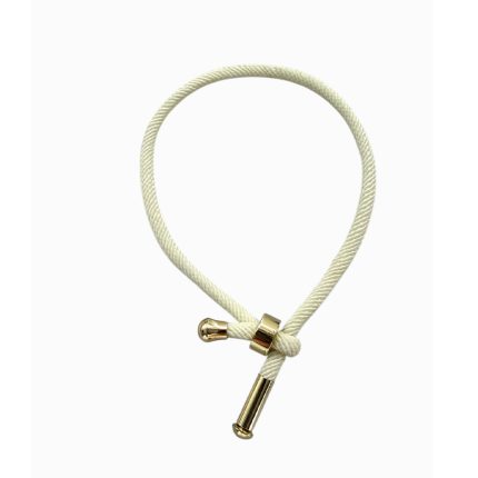 White rope bracelet with gold-tone end caps and a knotted stopper, looped for wear