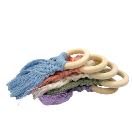 Stack of five pastel-colored knotted cords threaded through round wooden rings, forming a multicolored tassel-like accessory.