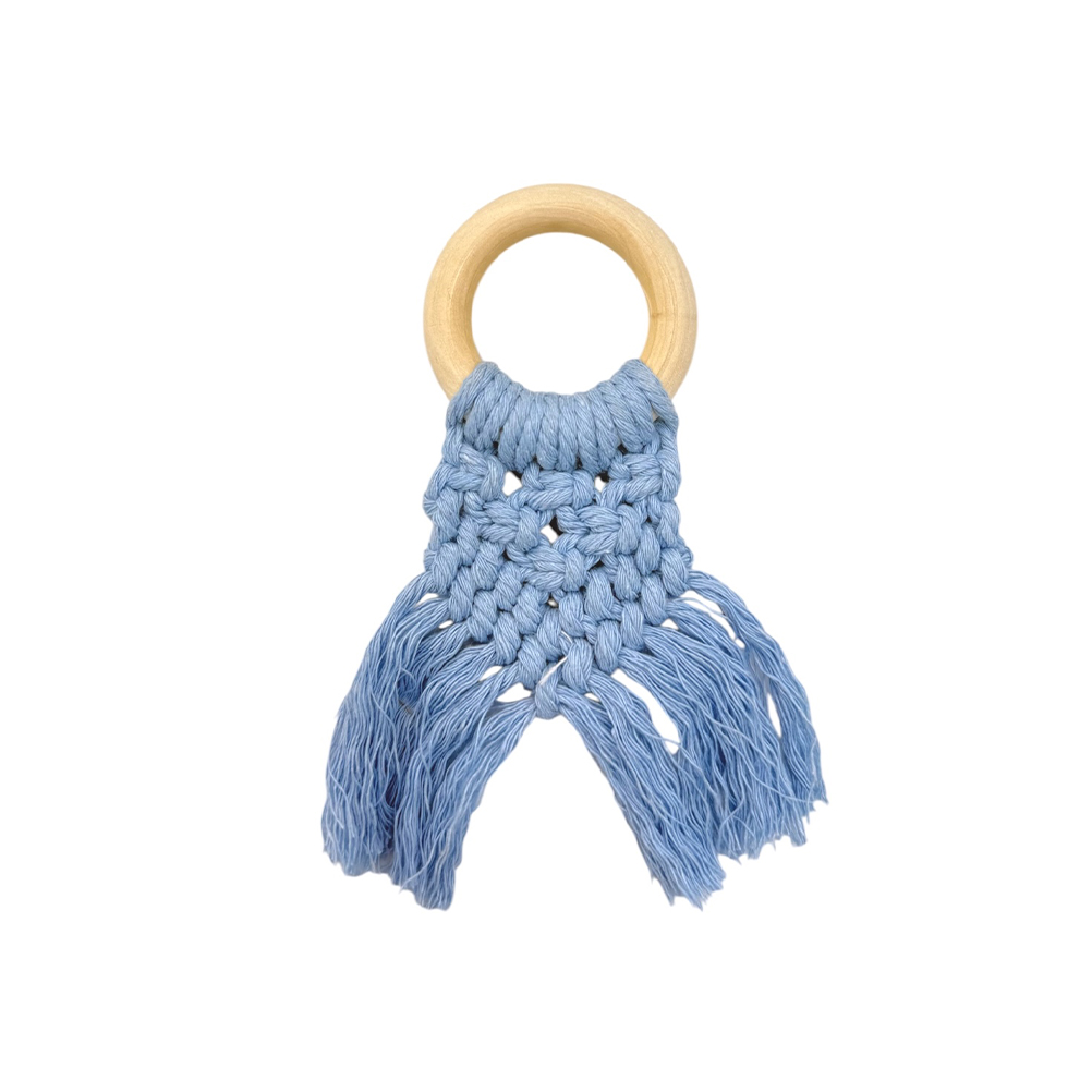 33C15F4A-98B1-D699-4C75-019D72007E86_11 | La Vie en Rose Wooden ring wrapped in blue macrame with tassels at the ends