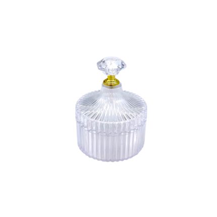 Clear glass perfume bottle with ribbed, cylindrical body and a faceted diamond-shaped stopper.