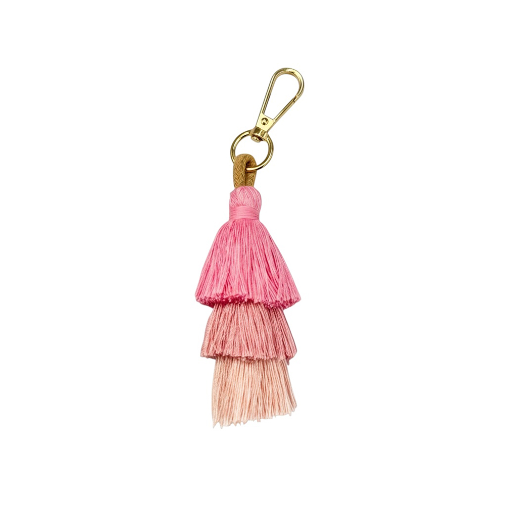 56F8D9A7-6D54-8CF7-4765-019D0579F593_11 | La Vie en Rose Gold-tone lobster clasp keychain with three layered pink tassels (hot pink, pink, peach) hanging from a tan loop