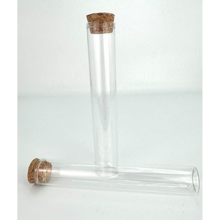 Two clear glass test tubes with cork stoppers, one standing upright and one lying on its side on a white surface.