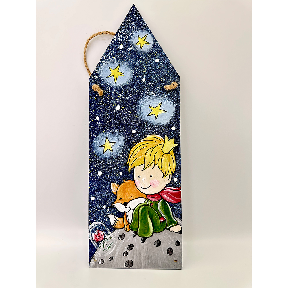 67988C1D-AA9A-C9EB-6209-018D4108D3D6_21 | La Vie en Rose House-shaped bookmark with a starry night sky, showing a smiling blonde boy wearing a crown and a small fox on a rocky surface.
