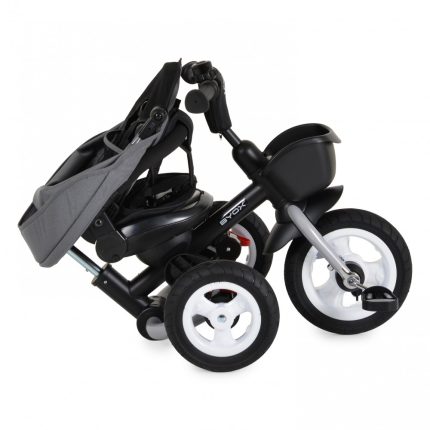 Folded three-wheeled baby stroller with gray canopy and black frame.