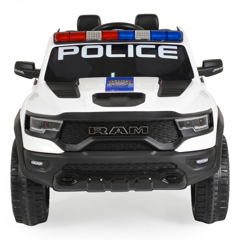 7463159-1000x1000 | La Vie en Rose Front view of a white toy police pickup truck with a red and blue light bar on the roof and a RAM grille.