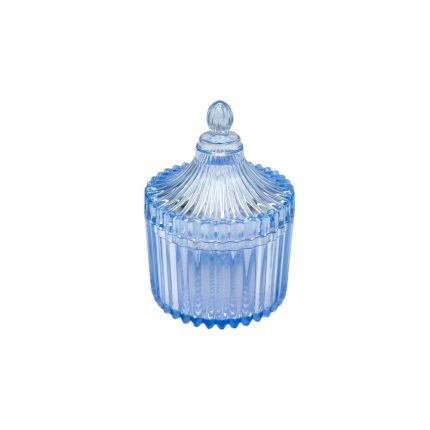 Blue glass candy jar with ribbed sides and a knobby lid on a white background