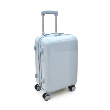 Light blue hard-shell suitcase with a telescoping handle and four spinner wheels ready for travel