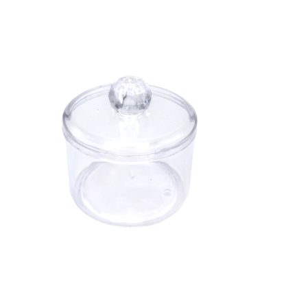 Small clear glass jar with a round lid and knob handle on top