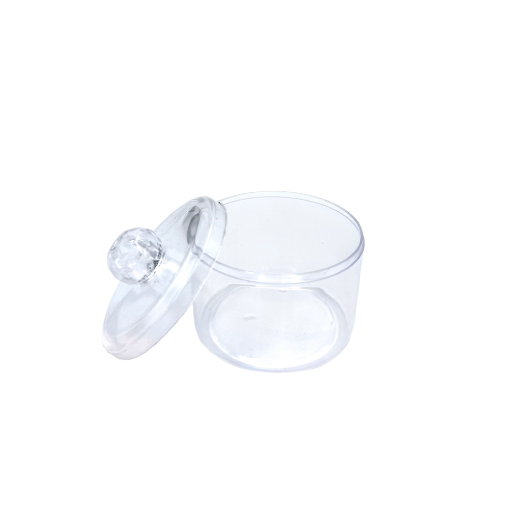 945CCE30-7C3E-2AC2-4820-019D6734233C_21 | La Vie en Rose Clear glass storage jar with a matching lid placed beside it, empty inside.