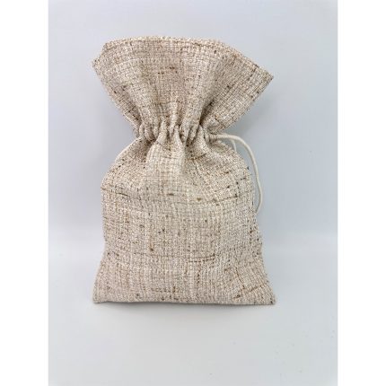 Beige burlap drawstring pouch tied at the top, standing on a light surface