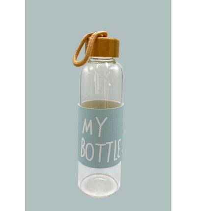 Clear glass water bottle with tan leather cap and loop, featuring a light blue label that says 'MY BOTTLE' against a muted background.