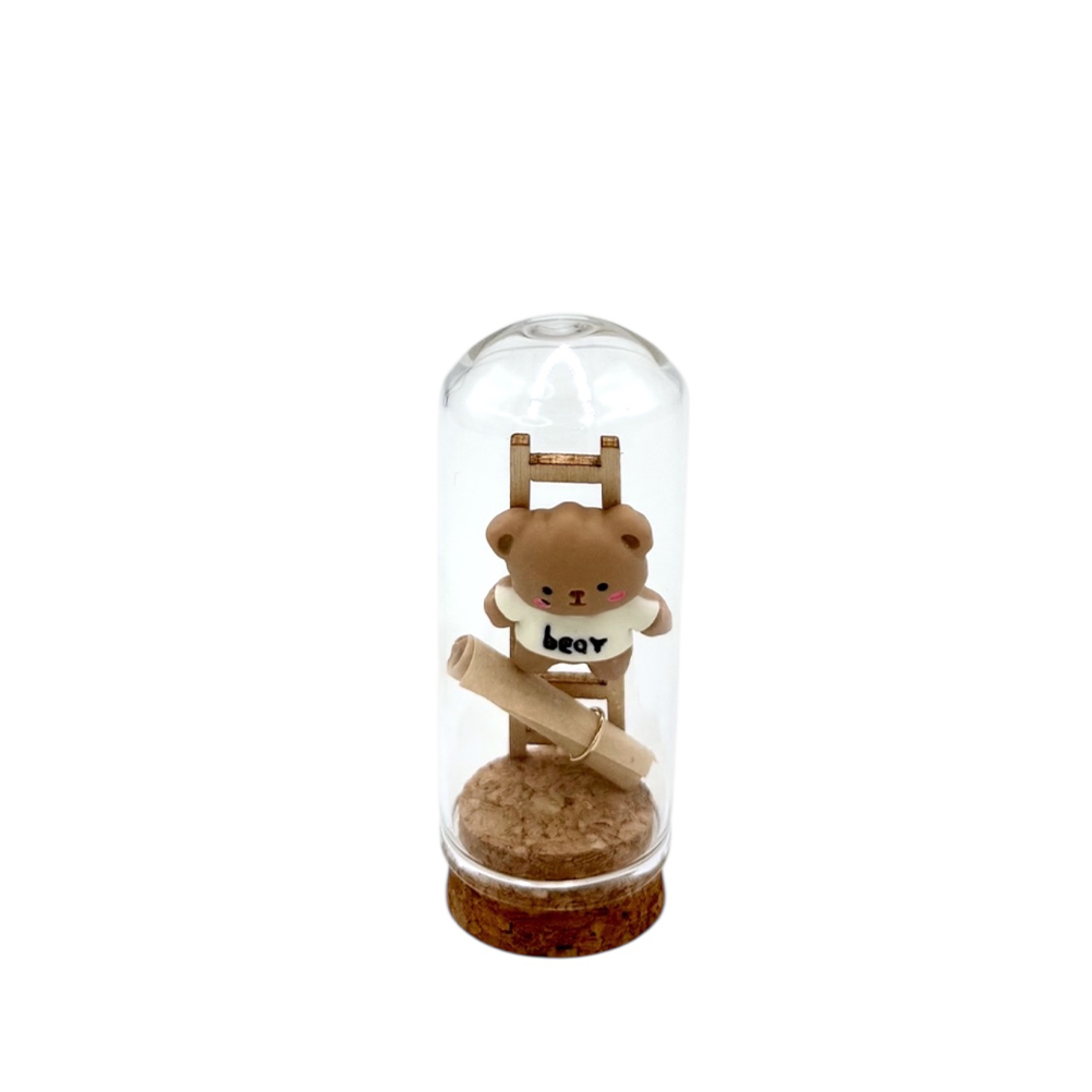 ED5E954D-515A-3FF8-C20B-019CFC20DB79_11 | La Vie en Rose Small teddy bear figurine climbing a wooden ladder inside a glass dome with a cork base