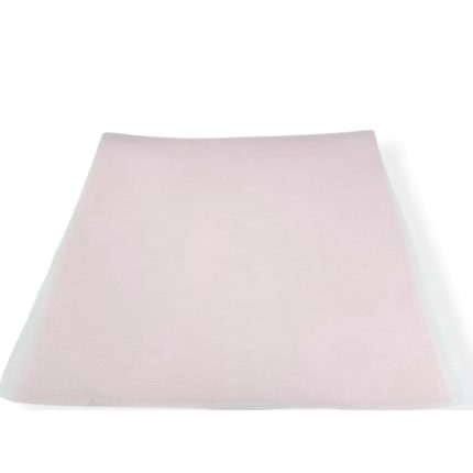 Light pink tulle fabric cut into a trapezoid shape, flat on a white background