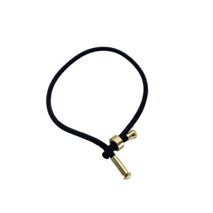 Black braided cord bracelet with a gold-tone bar toggle clasp.
