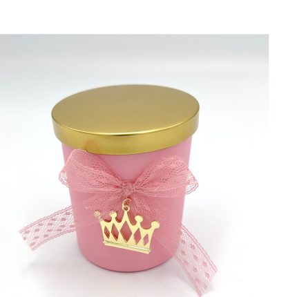 Pink gift box with a gold lid, tied with pink lace and a gold crown charm.