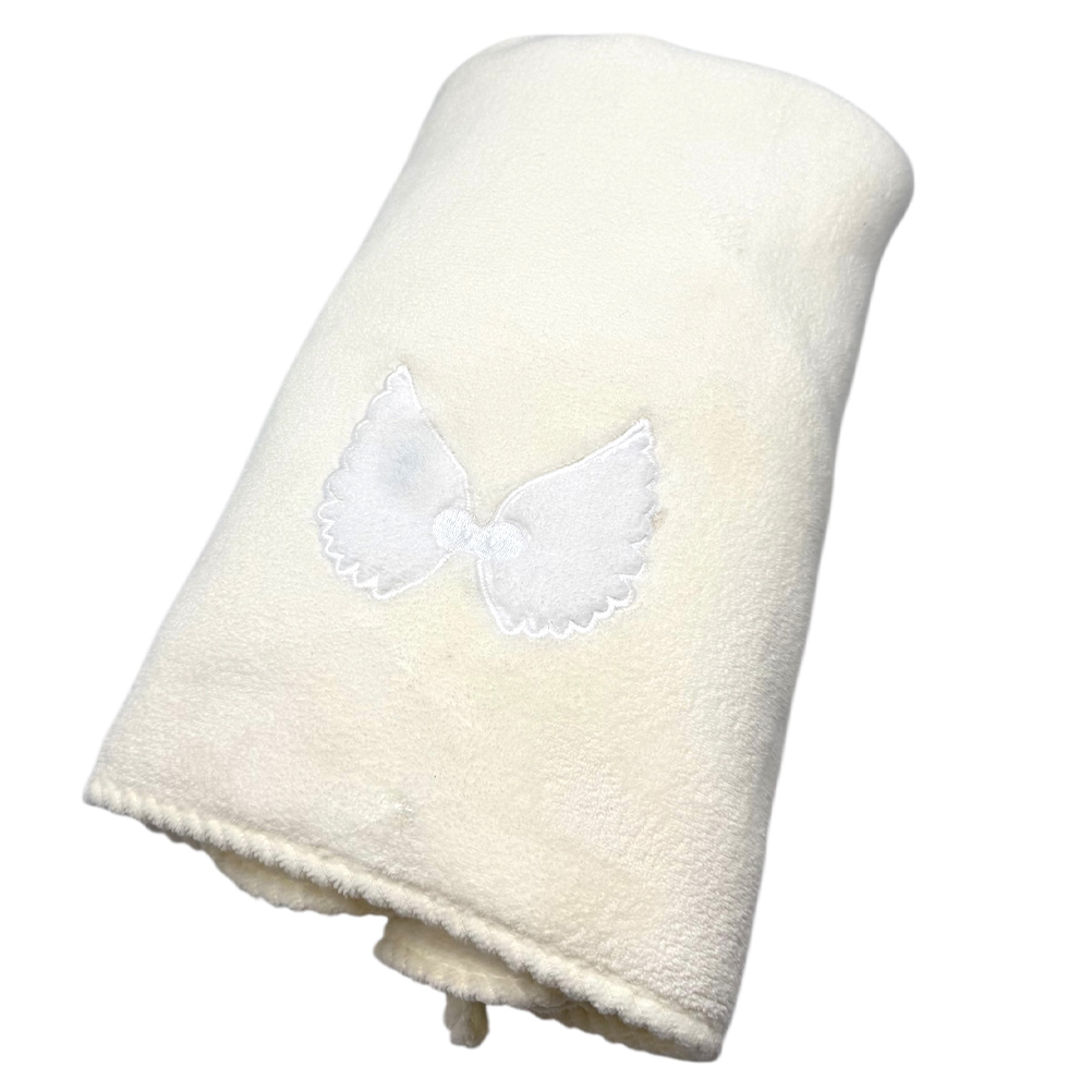 FD684572-9C93-06C7-2845-019D04F1F6AF_11 | La Vie en Rose White plush towel with a stitched white butterfly emblem.