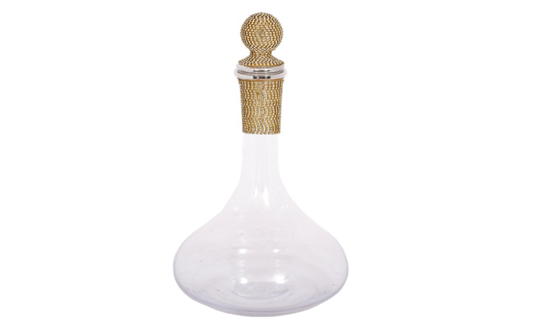 05034091 | La Vie en Rose Clear glass decanter with a bulbous base and a gold beaded stopper.