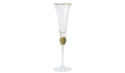 Clear champagne flute with a gold-accented stem, used for serving sparkling wine.