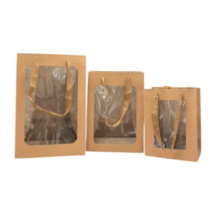 Kraft paper gift bags with clear plastic windows and tan handles, arranged in descending size order.