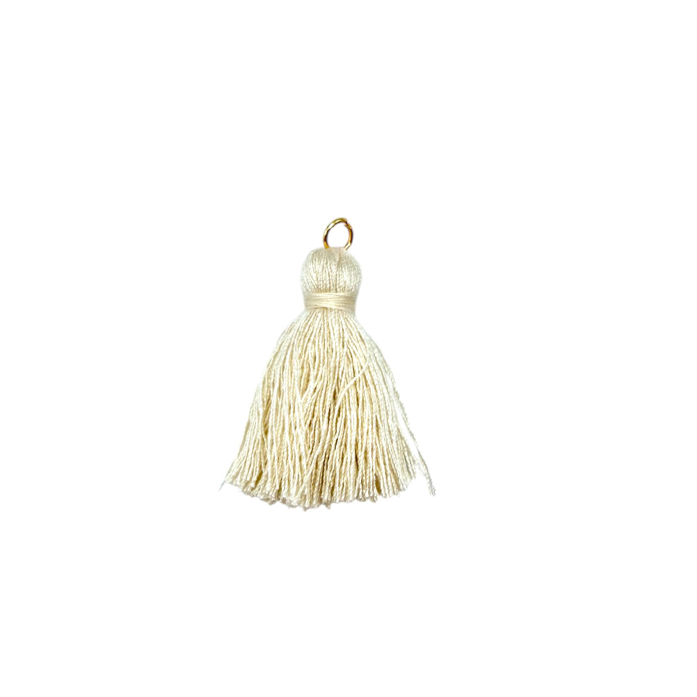 0BBC7E76-4C19-0753-6091-019D1ECD0D35_11 | La Vie en Rose Cream tassel pendant with a small gold loop at the top, used as a jewelry or craft accessory.