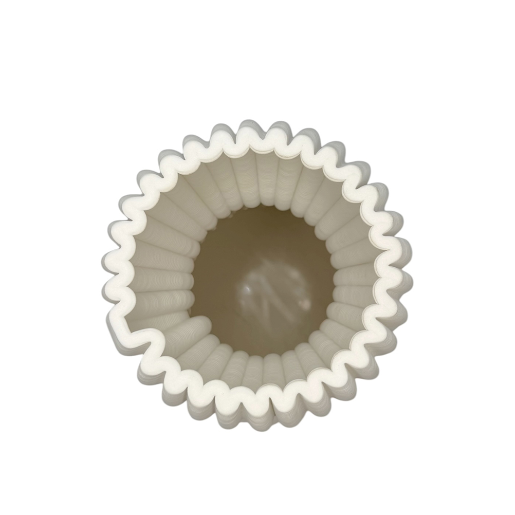 1BA84F43-0C0B-078B-681F-019DB9A79F1B_21 | La Vie en Rose Top-down view of a white, fluted round cupcake liner (muffin cup) with ridged edges and an empty center.