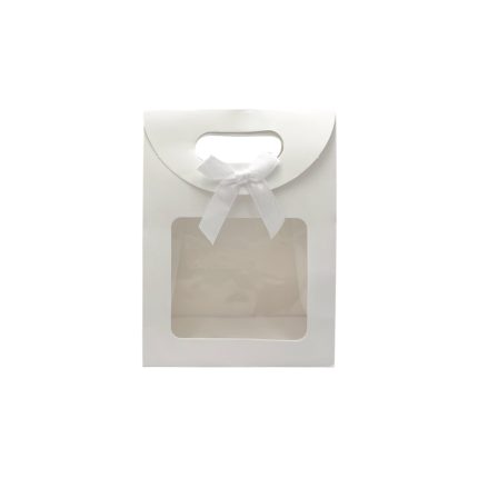 White gift bag with a clear window and a white ribbon tied in a bow at the handle.