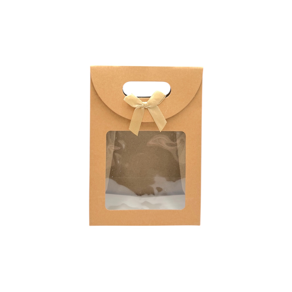 21C4E9B7-16B2-7F9F-A83A-019DAAD3167B_11 | La Vie en Rose Brown kraft gift box with a clear window showing a pastry inside, tied with a beige ribbon.