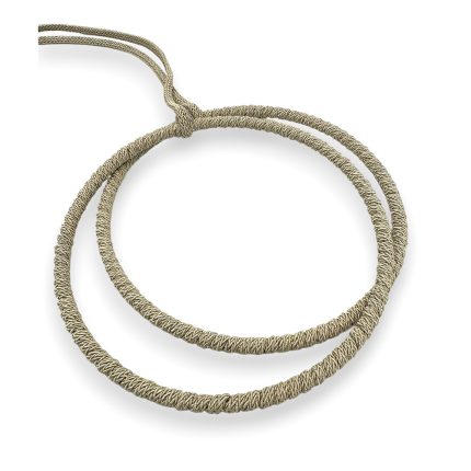 Gold-toned braided rope necklace laid in a loose loop on a white background