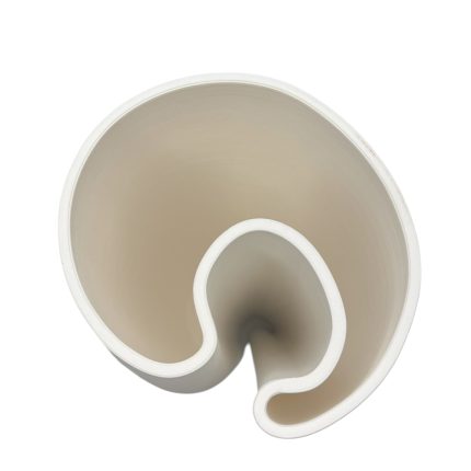 Cream-colored spiral silicone tube viewed from above.