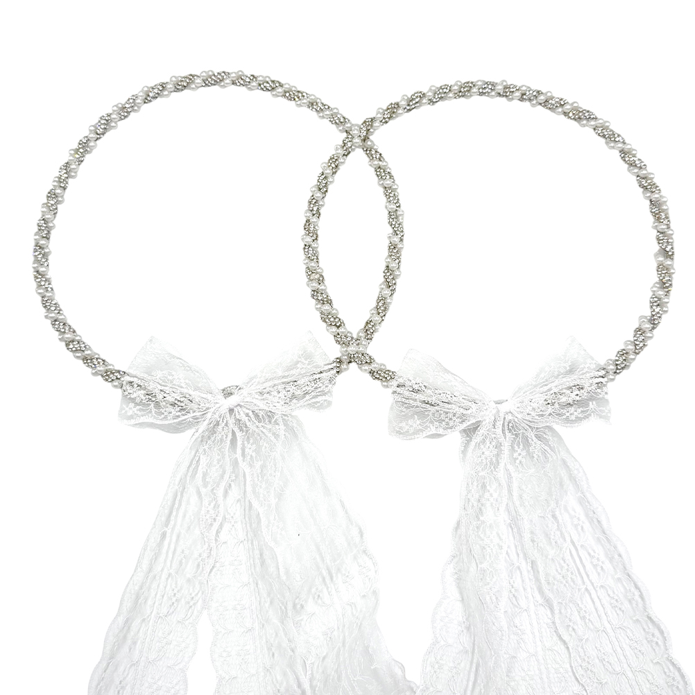 73EB907B-7C1F-3A83-5134-019ED0959730_11 | La Vie en Rose Two silver braided headbands with white lace bows and long lace ribbons (bridal accessories).