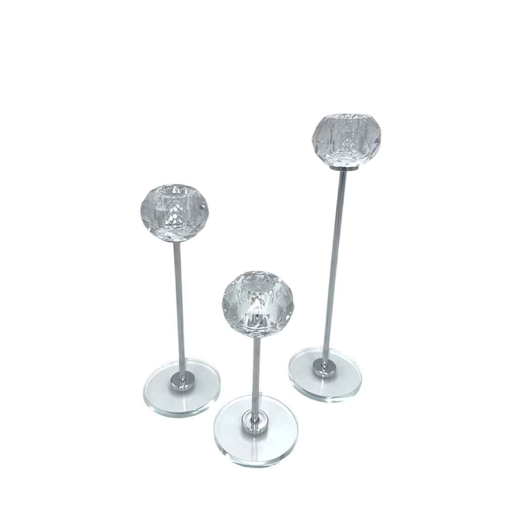 86ACC094-5D70-1F6A-D74E-019D493EA287_21 | La Vie en Rose Three decorative crystal glass spheres mounted on slim metal rods with round glass bases at varying heights.