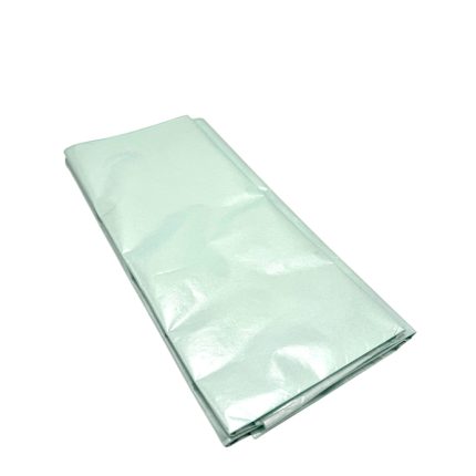 Folded mint-green tissue paper sheet ready for wrapping
