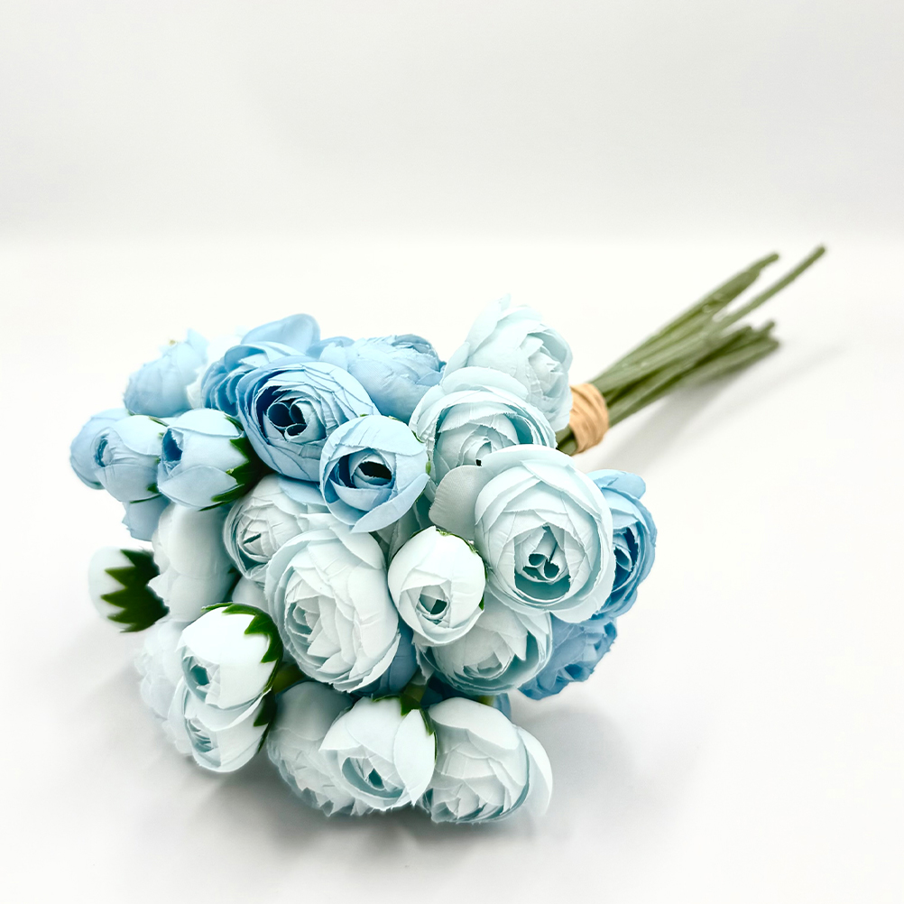 910FAEBE-9052-3046-2B13-019C9A416070_11 | La Vie en Rose Bouquet of pale blue artificial ranunculus flowers tied with twine.