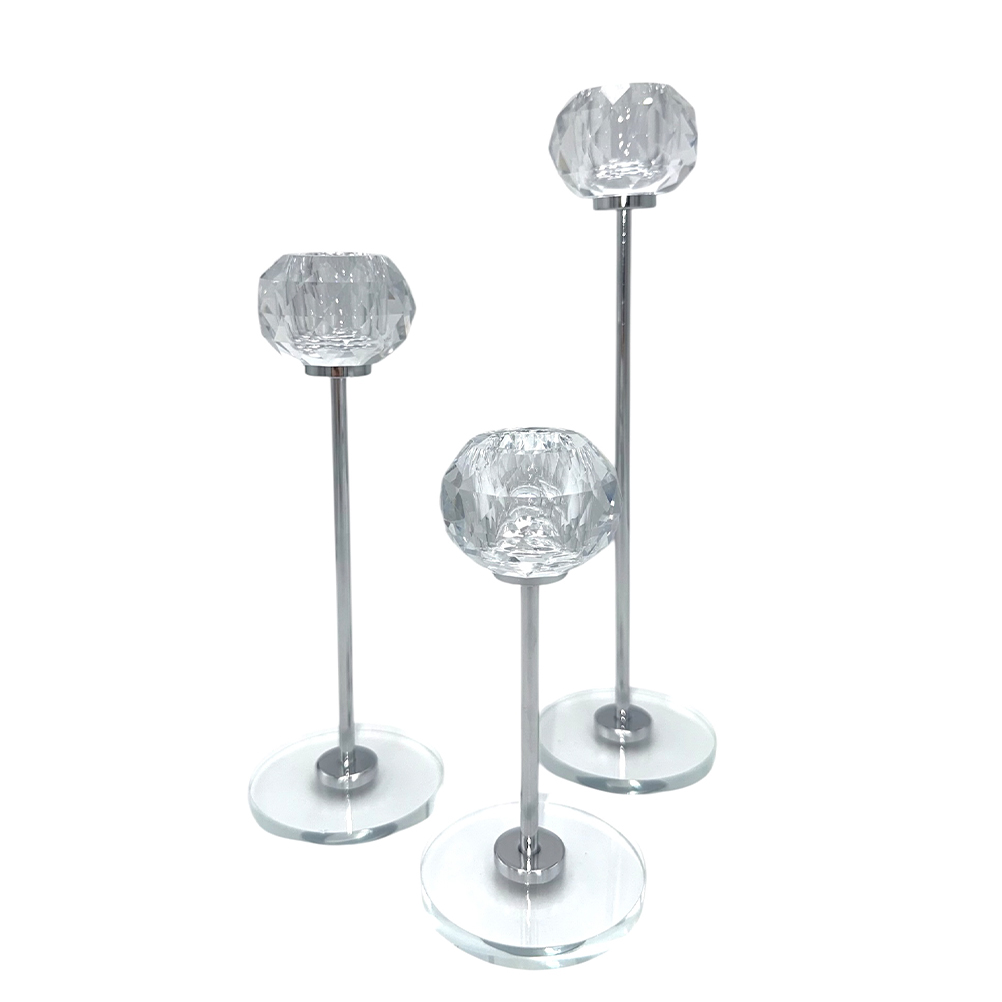 A00B2265-D11F-1F1F-0B22-019D493E51D8_11 | La Vie en Rose Three crystal-topped decorative candle holders on metal stems of varying heights with clear glass bases.