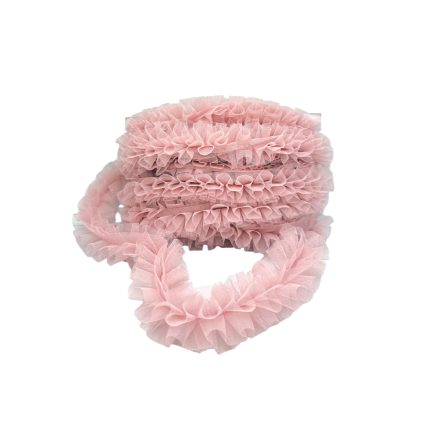 Stack of pink frilly mesh hair scrunchies arranged in a coiled display