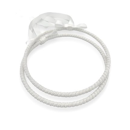 White braided wedding garter with satin ribbons tied in a bow at one end.