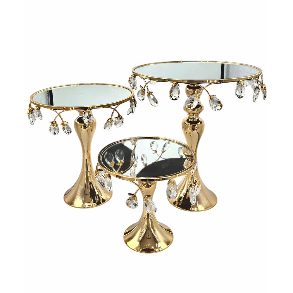 B0C8E6F2-986D-1BEA-3791-019D48D538A4_11 | La Vie en Rose Gold-tone three-piece tables with mirrored tops and dangling crystal pendants on ornate gold stands, forming a decorative nesting set