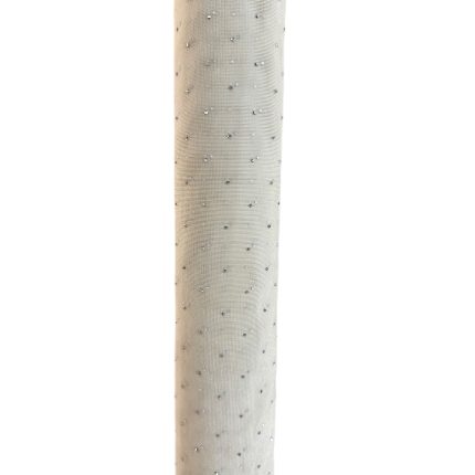 Beige fabric roll with small scattered silver beads creating a dotted pattern, shown in a close-up view